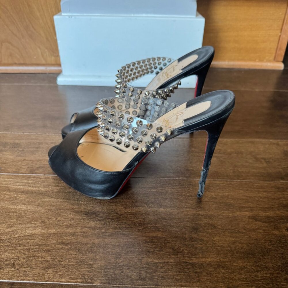 Christian Louboutin studded black and tan high heels